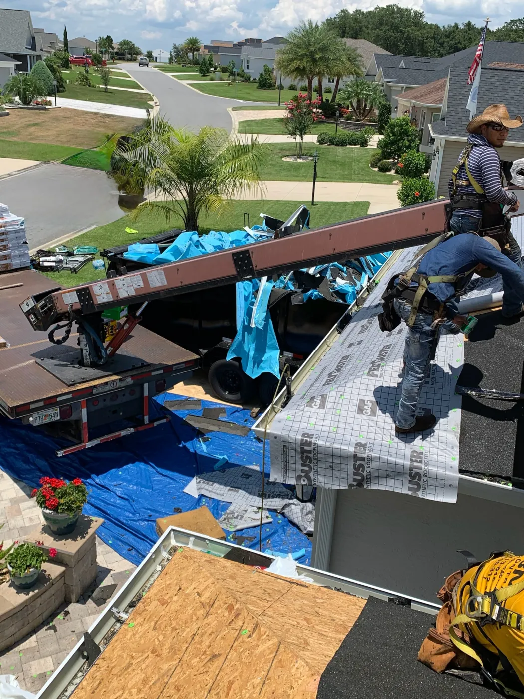 Shingle Delivery & Driveway Protection | Sentinel Roofing Alachua, FL ABC supplier shingle load with driveway protection and GAF FeltBuster for a Sentinel Roofing project in Alachua, FL