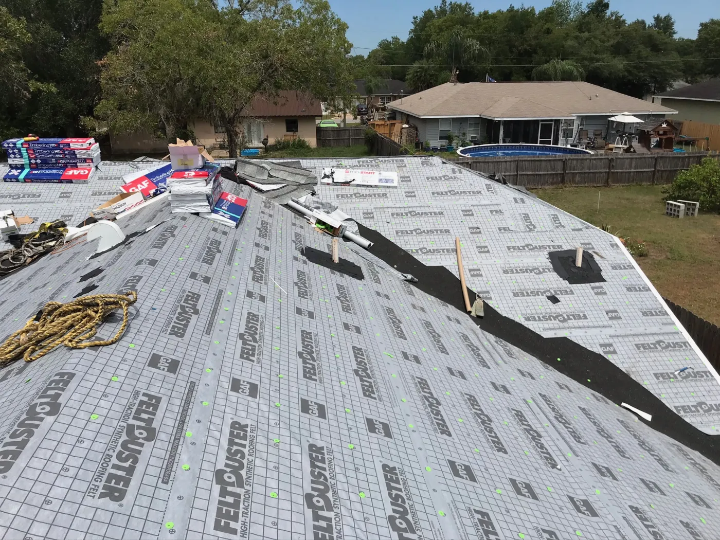 GAF FeltBuster & Ice and Water Shield Installation | Sentinel Roofing Alachua, FL GAF FeltBuster and ice and water shield underlayment installed around plumbing stacks with code-compliant nailing by Sentinel Roofing in Alachua, FL