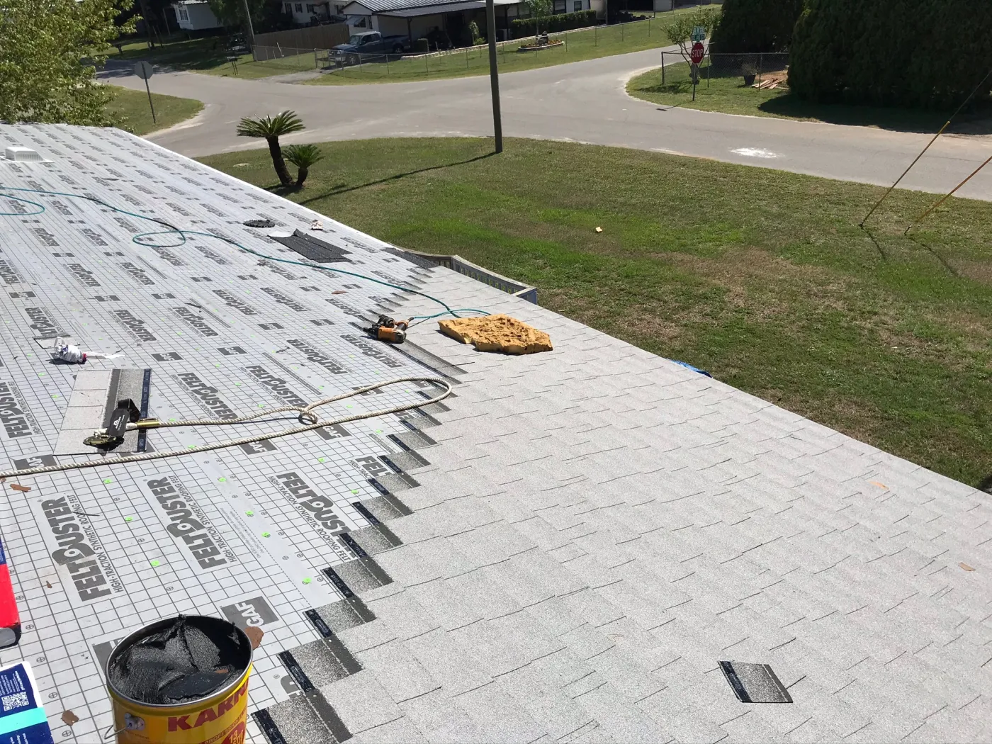 White GAF Shingle Roof Installation | Sentinel Roofing Alachua, FL White GAF shingle roof installation with FeltBuster underlayment and roofing cement by Sentinel Roofing in Alachua, FL