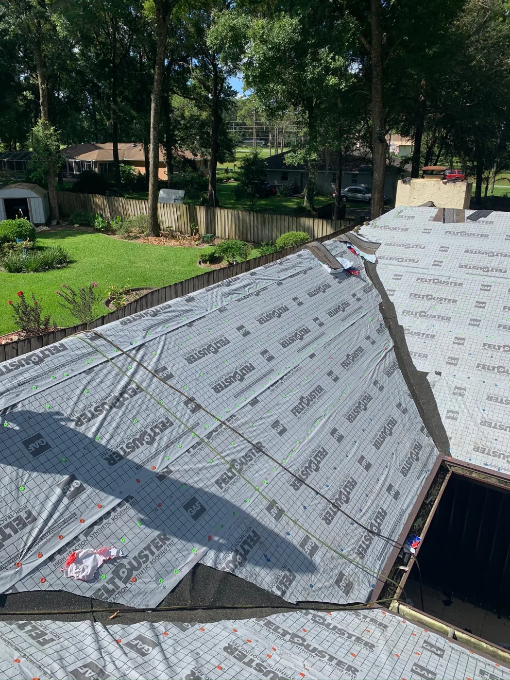 GAF HDZ Roof Replacement & Chimney Flashing | Sentinel Roofing Belleview, FL GAF HDZ shingle roof replacement with FeltBuster, IWS, valley protection, and chimney flashing by Sentinel Roofing in Belleview, FL