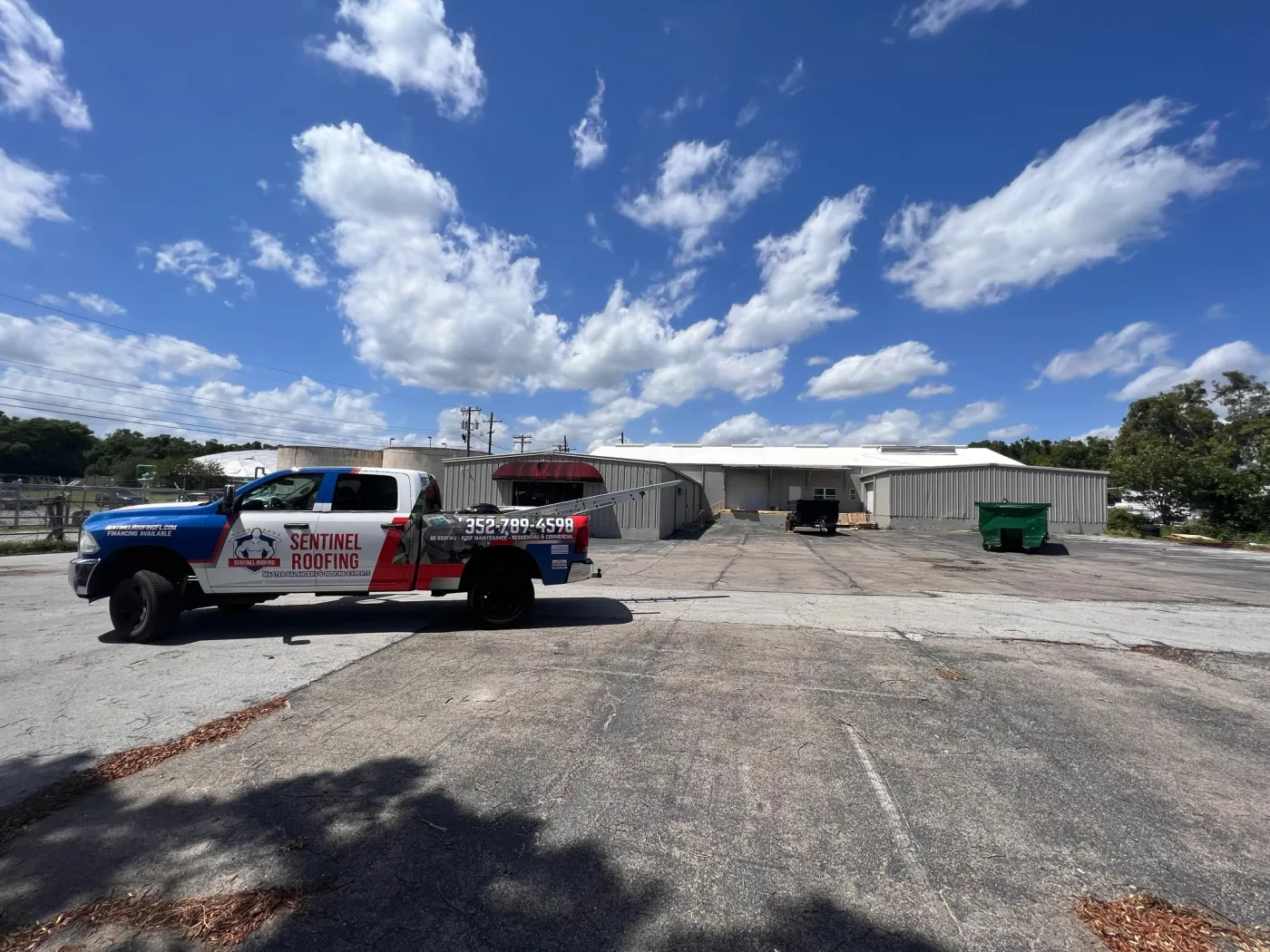 Commercial Metal Roof-Over | Sentinel Roofing Belleview, FL Commercial metal roof-over with insulation panels, roof coating, and gutters by Sentinel Roofing in Belleview, FL