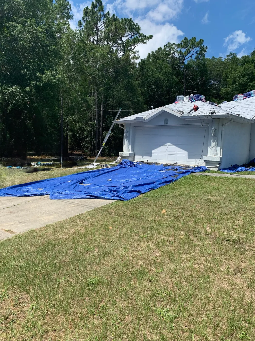 Driveway Protection Roof Replacement Gaf HDZ Shingle Feltbuster Clean Site Property Belleview Driveway Protection During Roof Replacement | Sentinel Roofing Belleview, FL