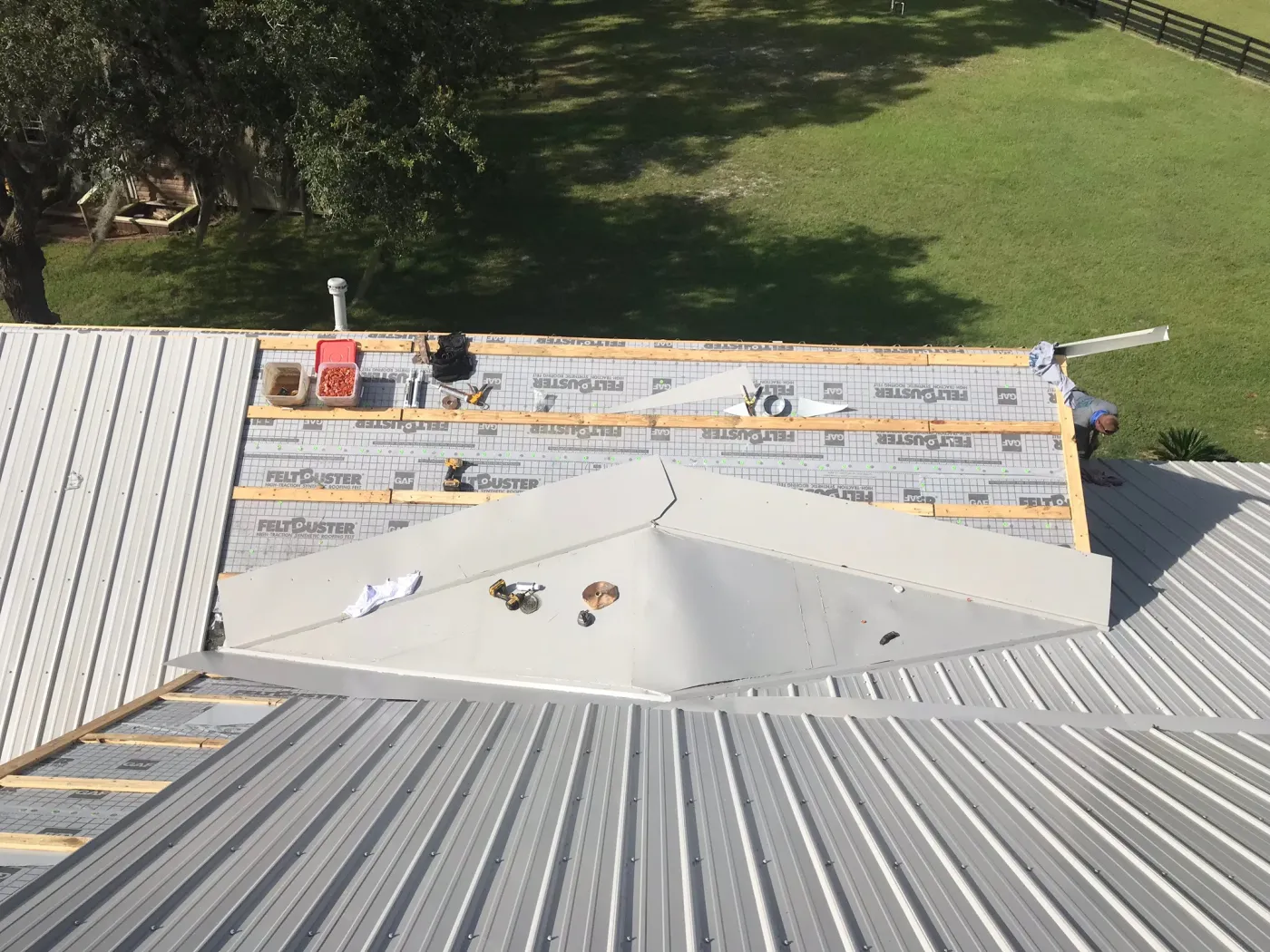 26-Gauge Metal Roof and Purlins in Dunnellon, FL 26-gauge metal roof with dead valley and wood purlins installed by Sentinel Roofing in Dunnellon, FL