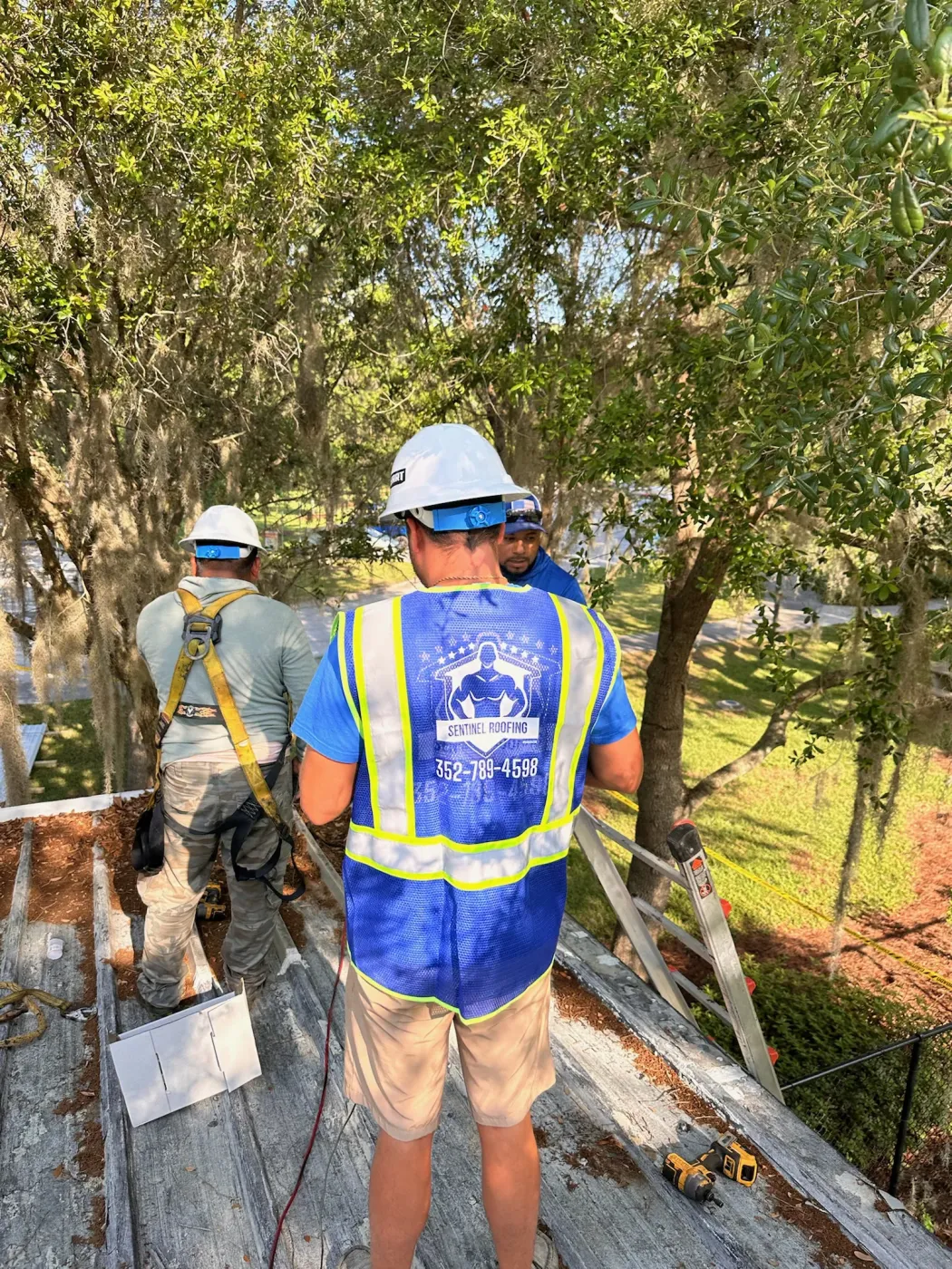 Roof Replacement Quality Assurance in Dunnellon, FL Sentinel Roofing crew performing roof replacement quality assurance in Dunnellon, FL
