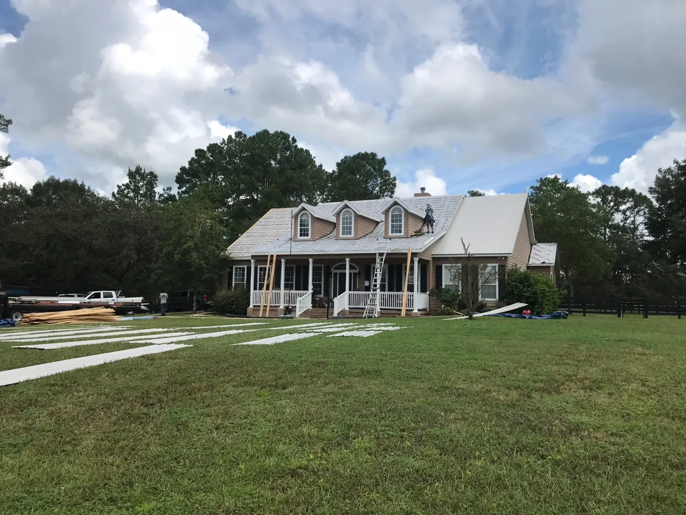 Metal Roof Replacement in Progress in Dunnellon, FL 26-gauge metal roof replacement in progress by Sentinel Roofing in Dunnellon, FL