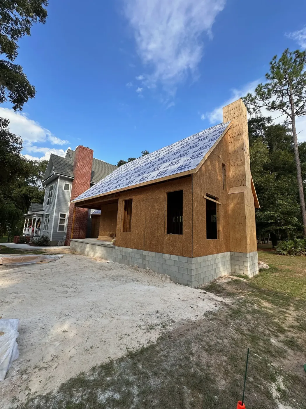 Stamped Metal Shingle Roof in Dunnellon, FL New construction stamped metal shingle roof installed by Sentinel Roofing in Dunnellon, FL
