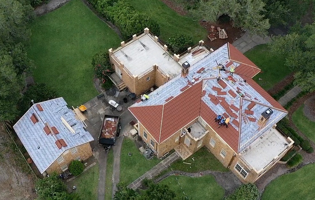 Drone view of residential roof replacement in process.