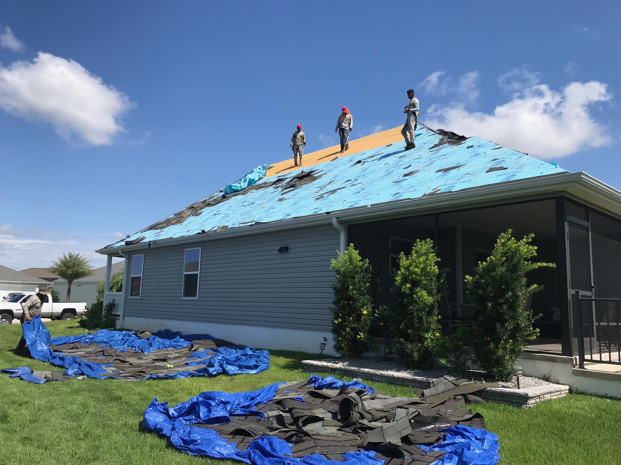 Sentinel Roofing completing a residential roof replacement with a clean worksite.